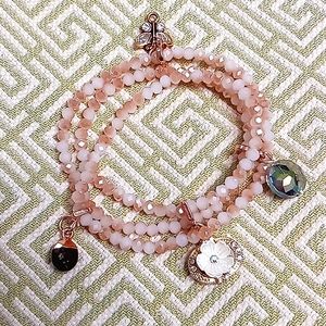 Glass beaded and charmed wrap bracelet